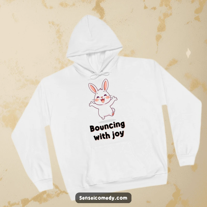 Funny Rabbit Sensei Hoodie: Warm garment featuring a happy rabbit leaping, offering cheerful and cozy vibes.